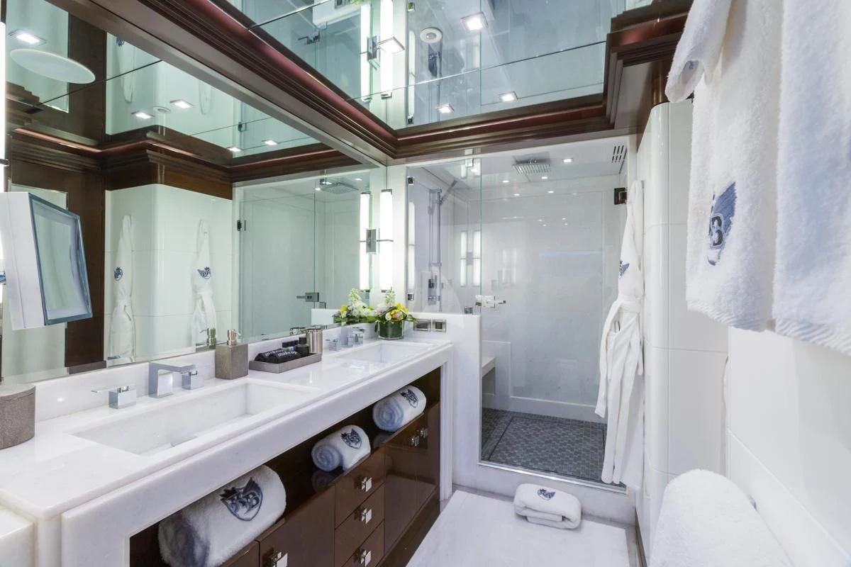 a bathroom with sinks and mirrors aboard KING BABY Yacht for Sale