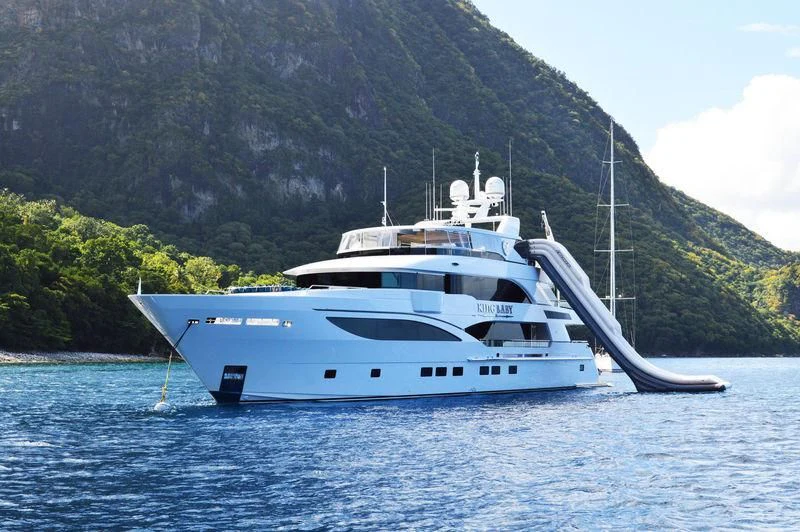 a white boat on water aboard KING BABY Yacht for Sale