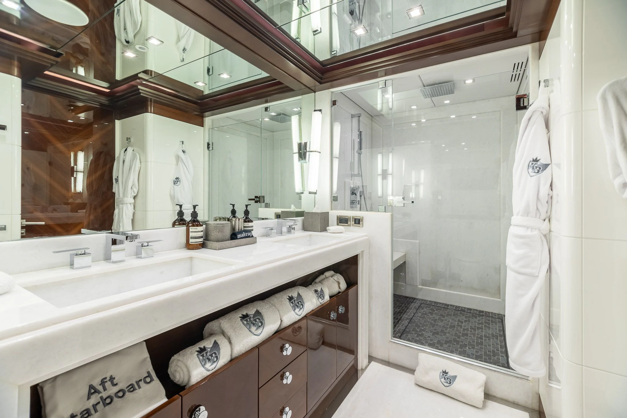 a bathroom with a large mirror aboard KING BABY Yacht for Sale