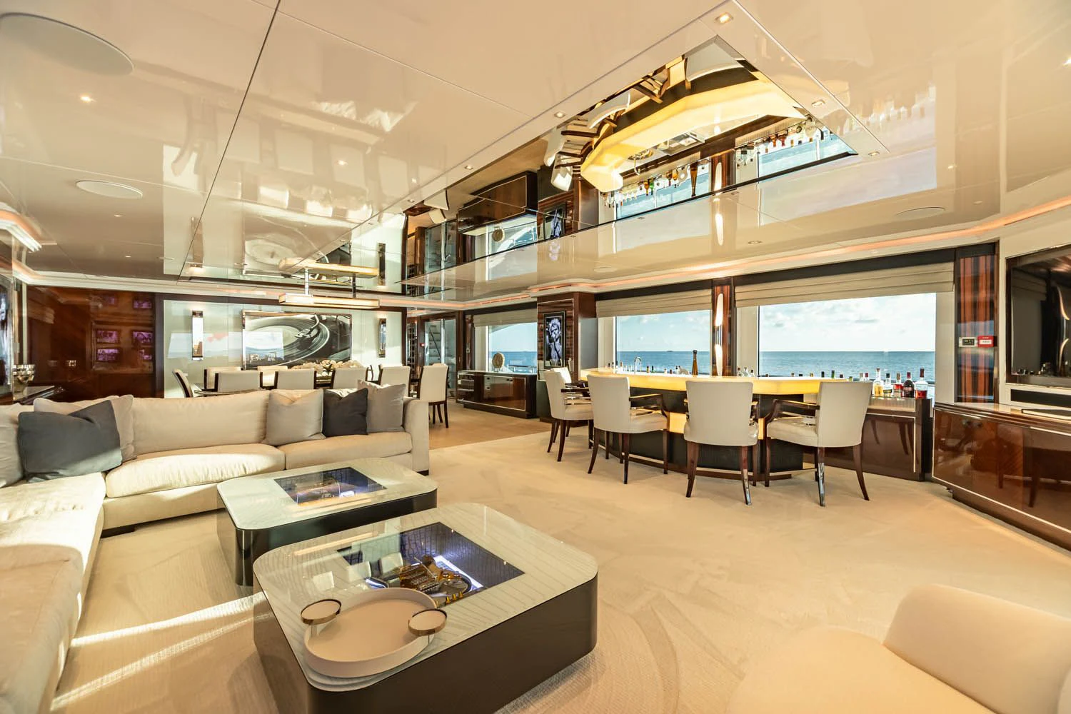 a living room with a large window aboard KING BABY Yacht for Sale