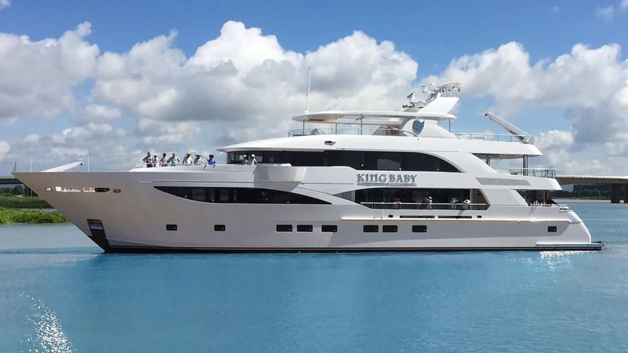 a white yacht on the water aboard KING BABY Yacht for Sale