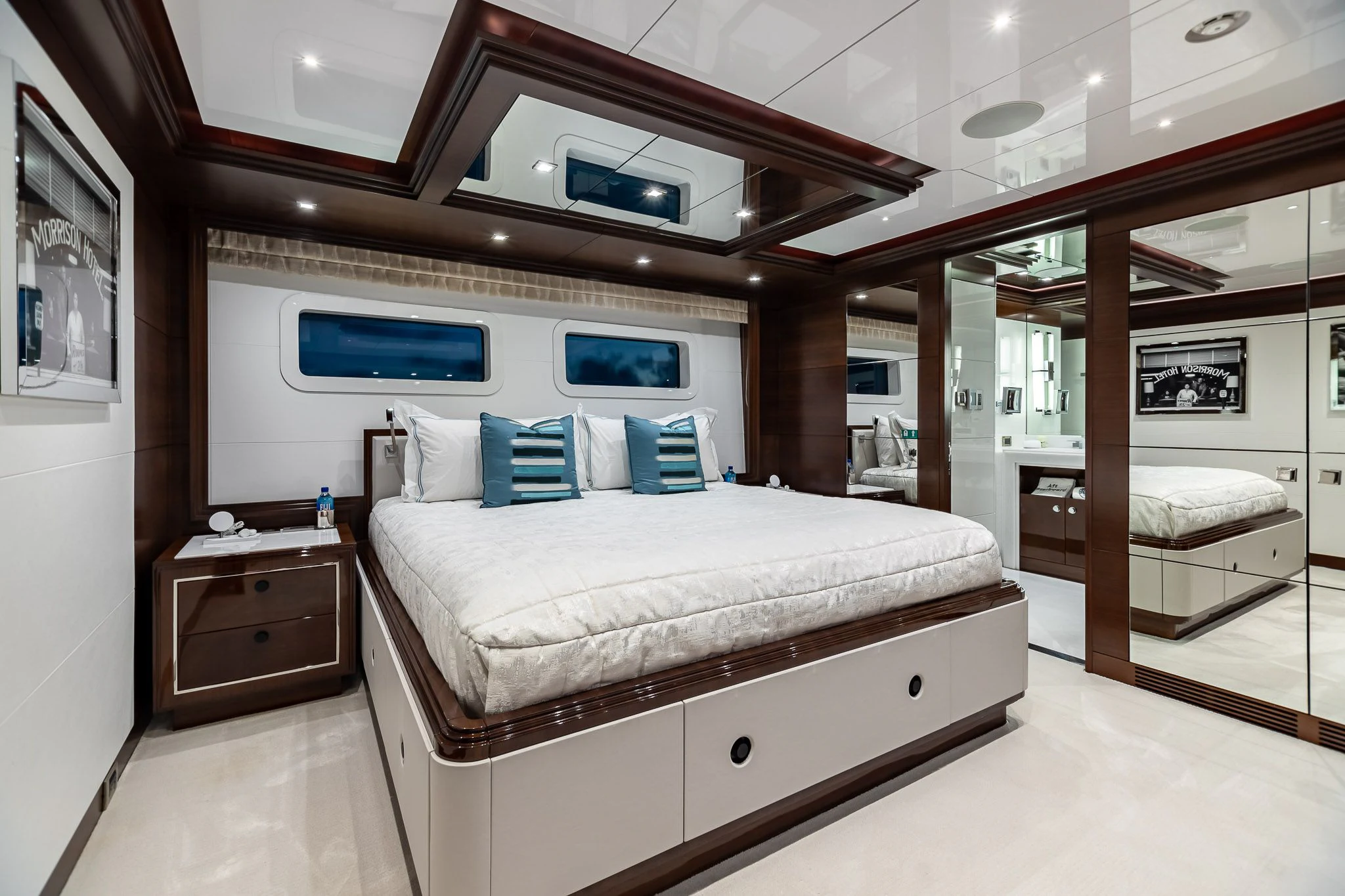 a room with a bed and a mirror aboard KING BABY Yacht for Sale