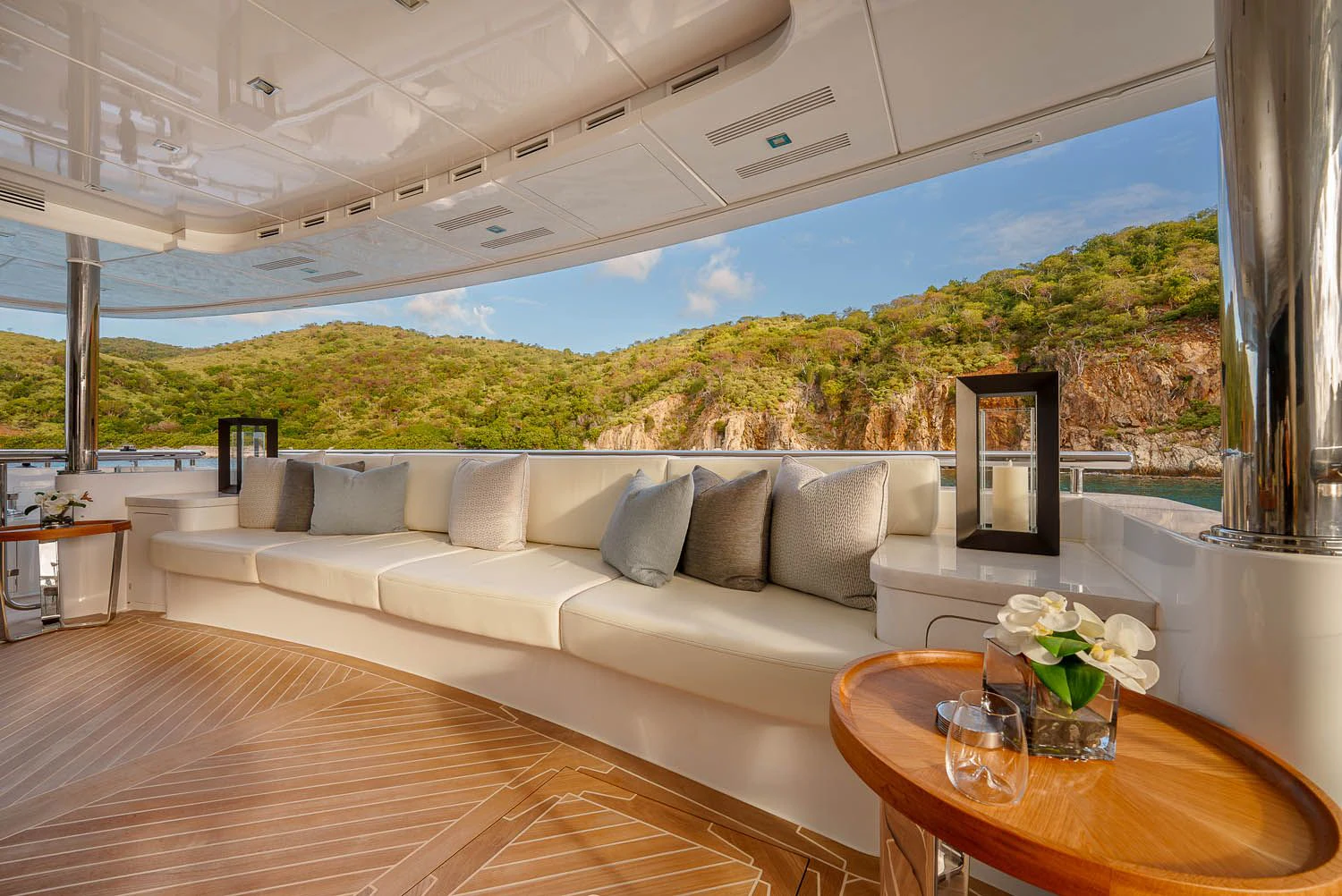 a large white couch sits in a living room aboard KING BABY Yacht for Sale