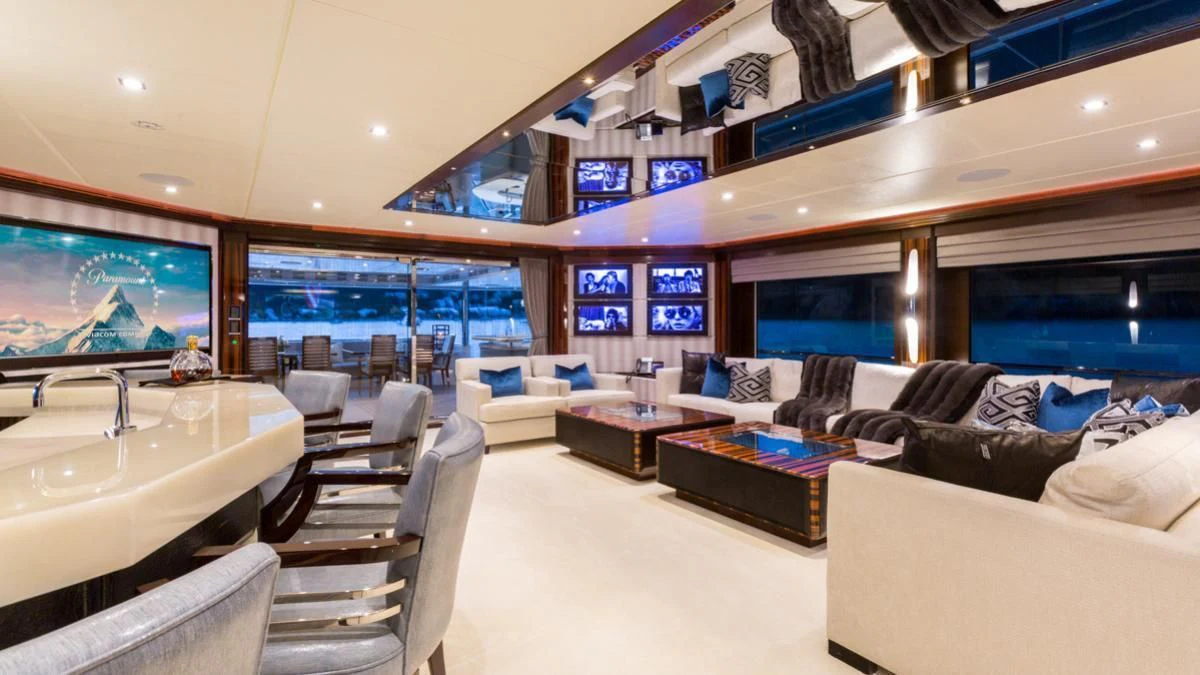 a large living room with a large window aboard KING BABY Yacht for Sale