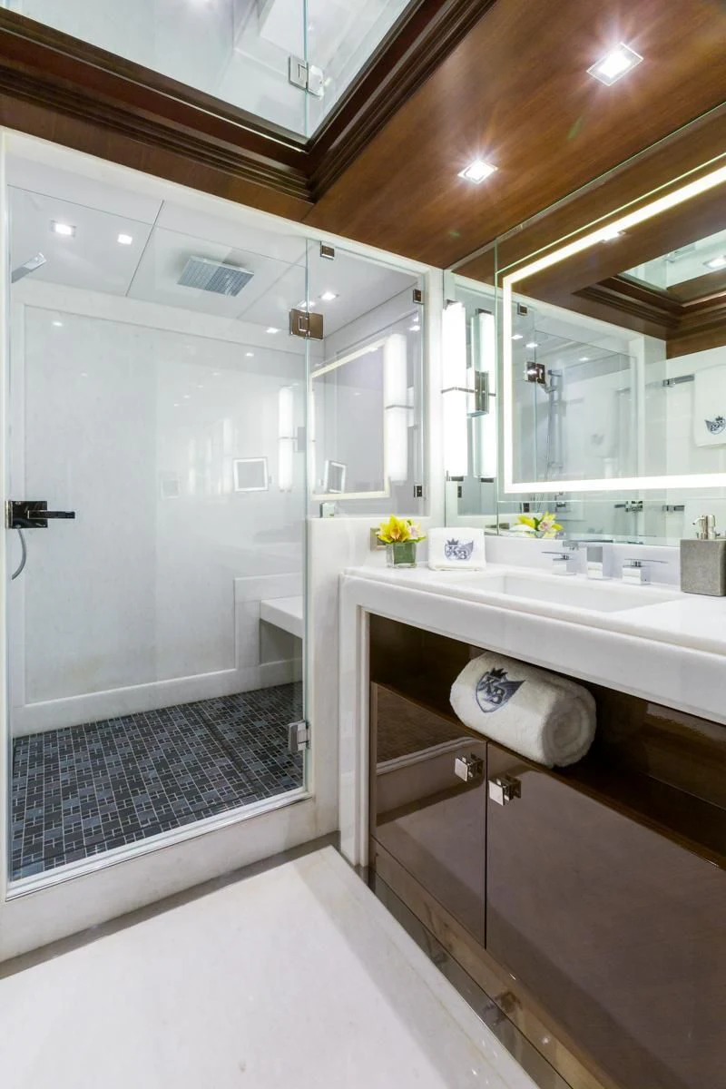 a bathroom with a sink and a mirror aboard KING BABY Yacht for Sale