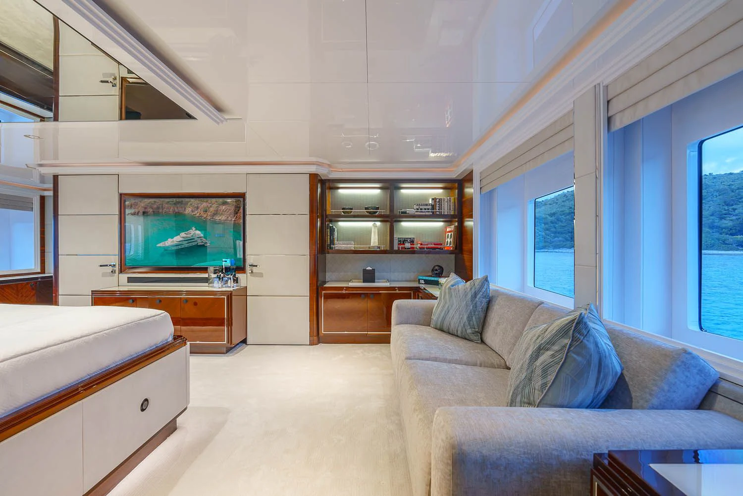 a living room with a large tv aboard KING BABY Yacht for Sale