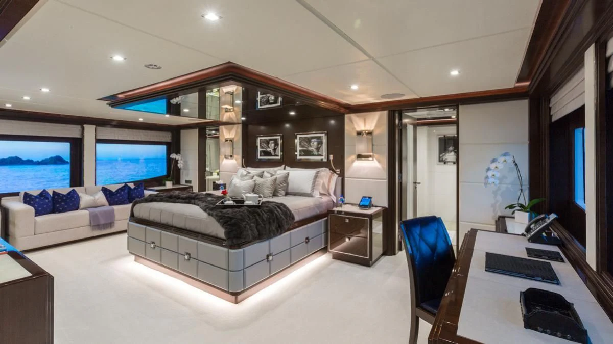 a living room with a large window aboard KING BABY Yacht for Sale