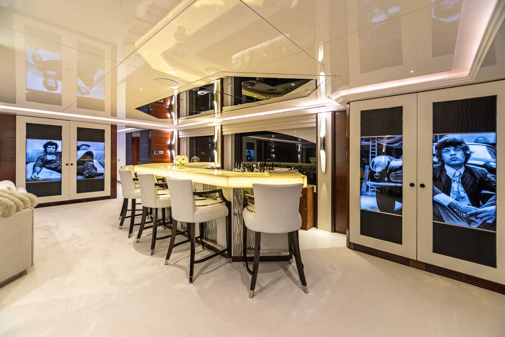 a room with a table and chairs aboard KING BABY Yacht for Sale