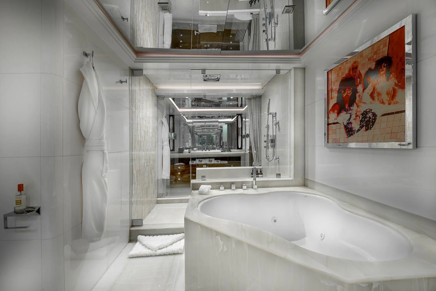 a bathroom with a bathtub and a shower aboard KING BABY Yacht for Sale