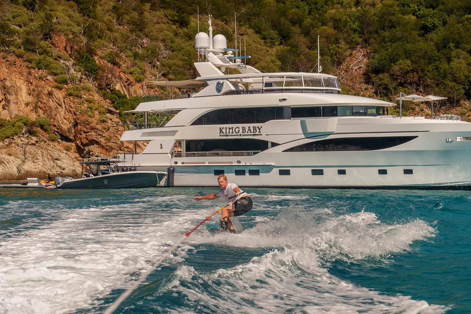 a person riding a jet ski aboard KING BABY Yacht for Sale