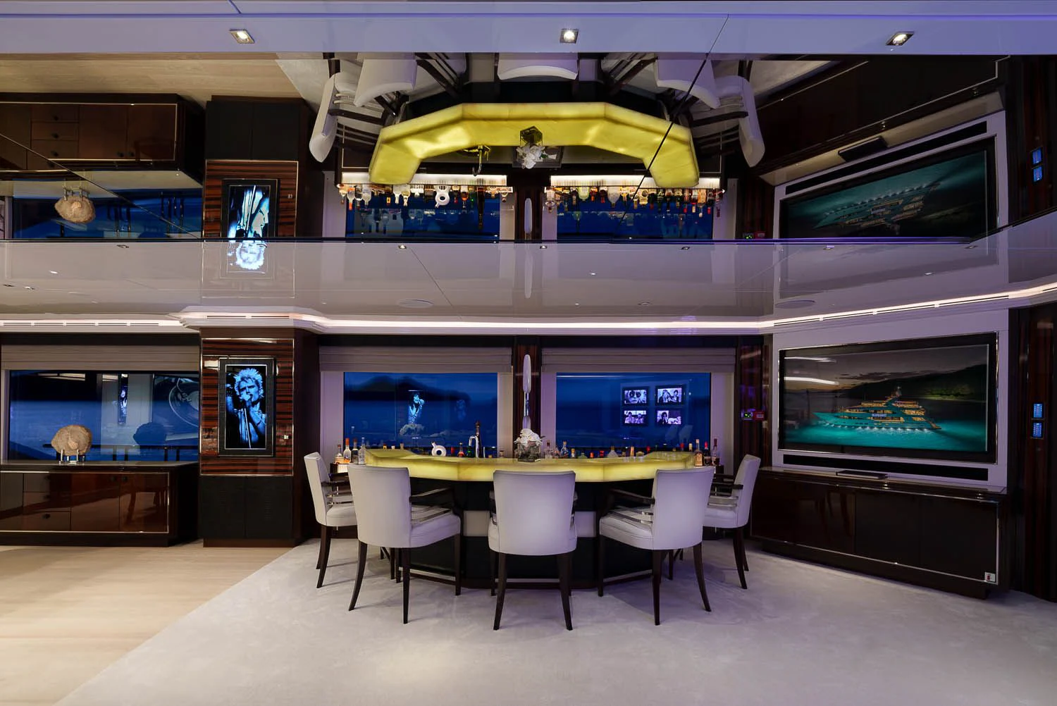 a room with a table and chairs aboard KING BABY Yacht for Sale