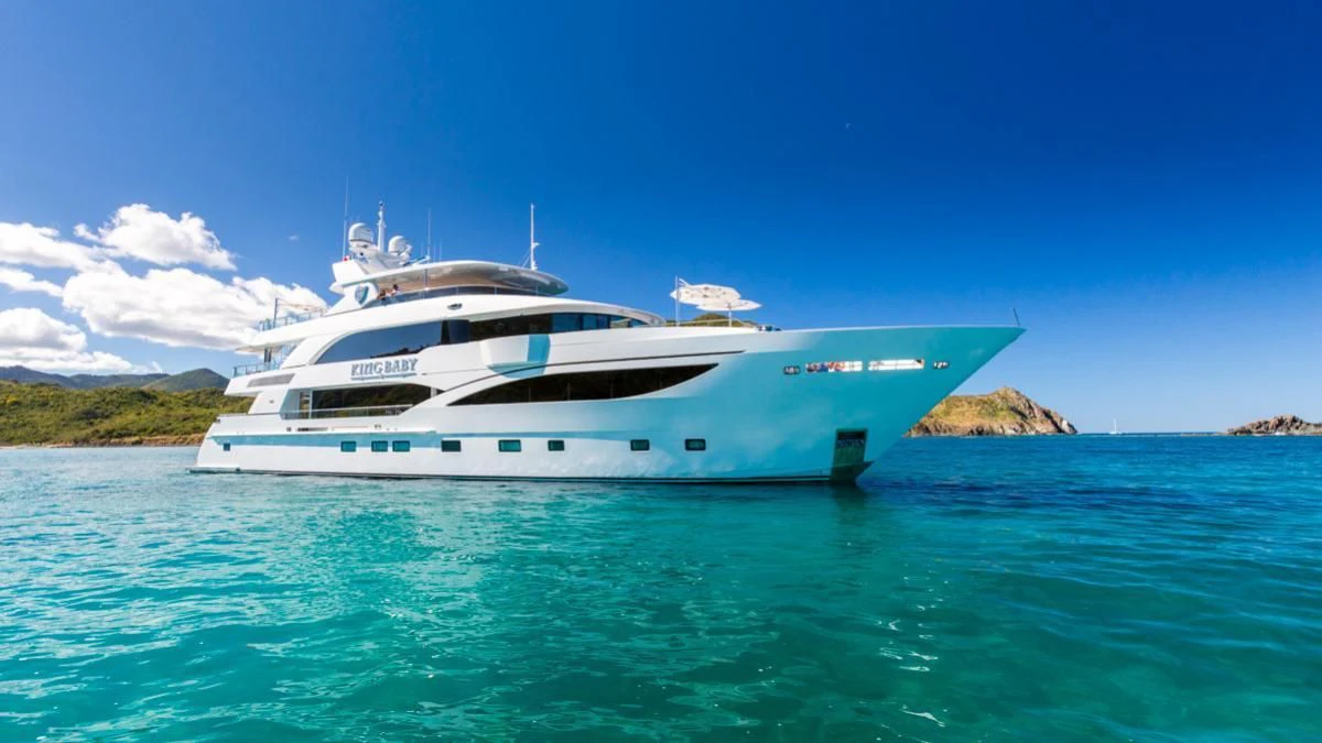 a white yacht in the water aboard KING BABY Yacht for Sale