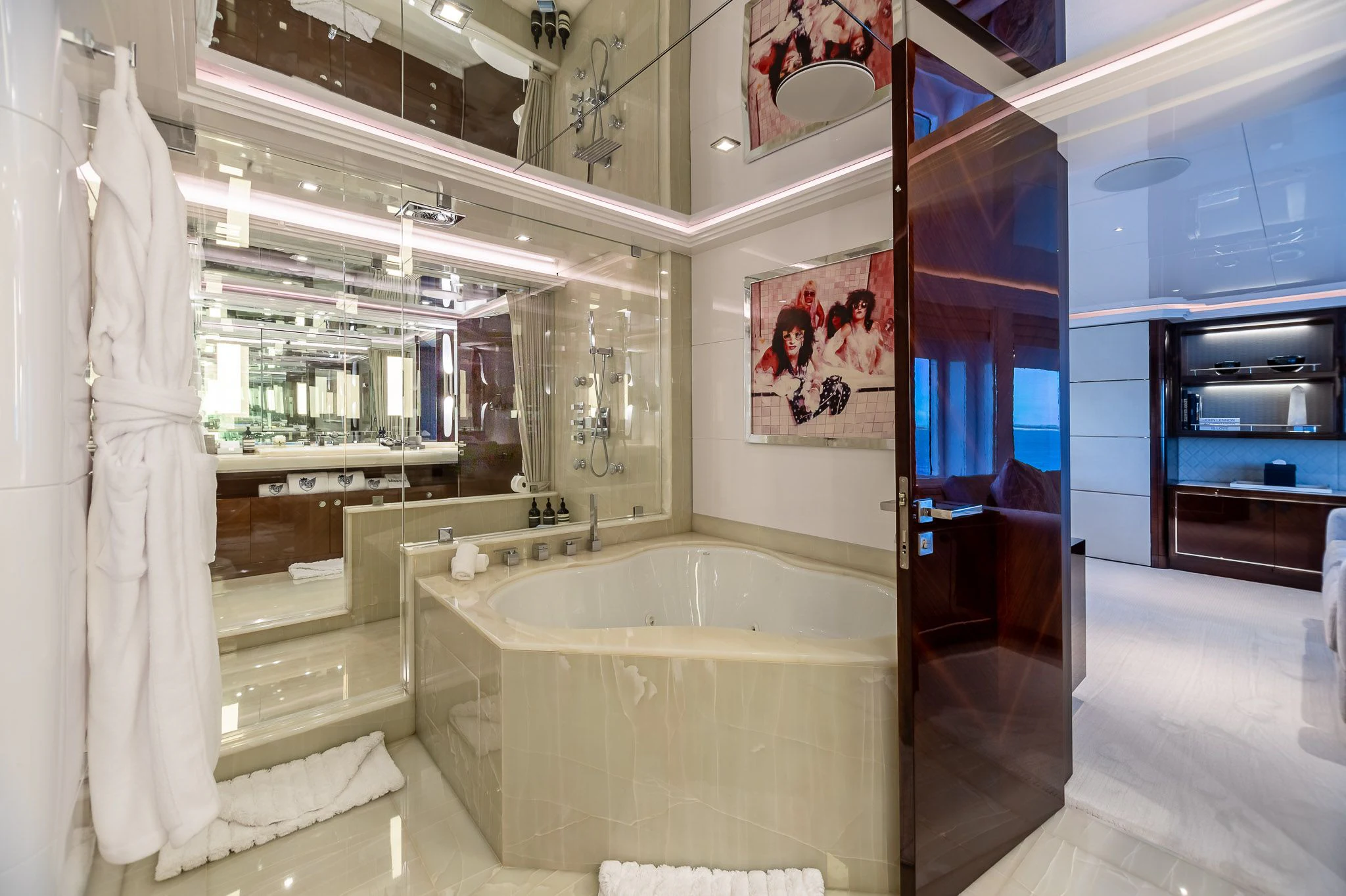 a bathroom with a bathtub and a sink aboard KING BABY Yacht for Sale