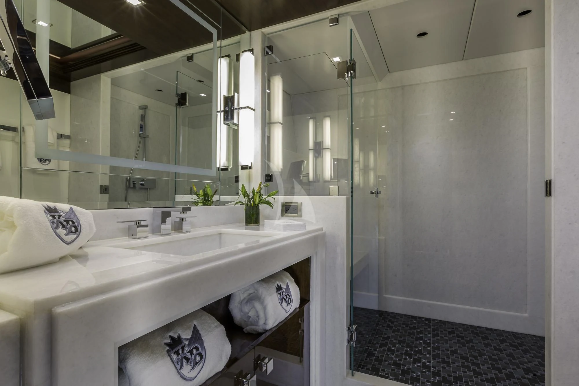 a bathroom with a large mirror aboard KING BABY Yacht for Sale