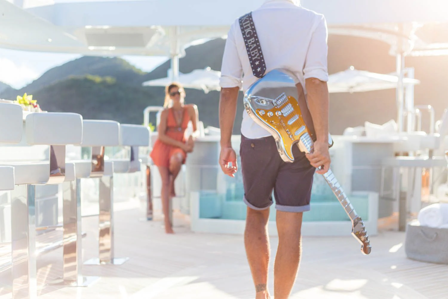 a person holding a pole aboard KING BABY Yacht for Sale