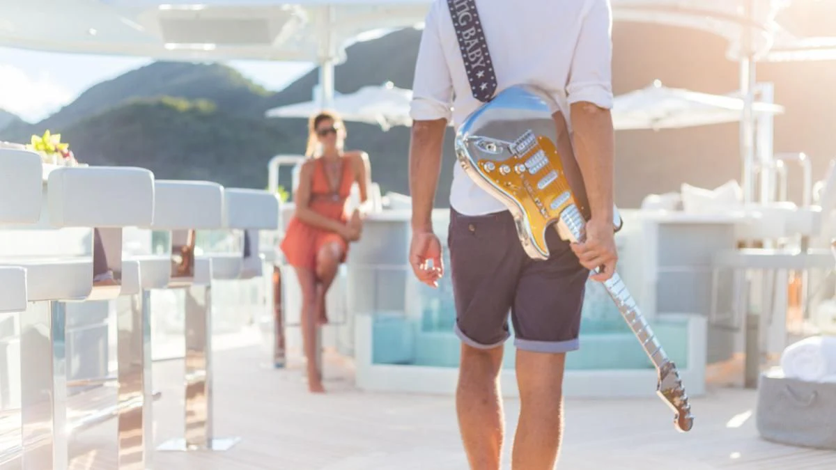 a person holding a skateboard aboard KING BABY Yacht for Sale