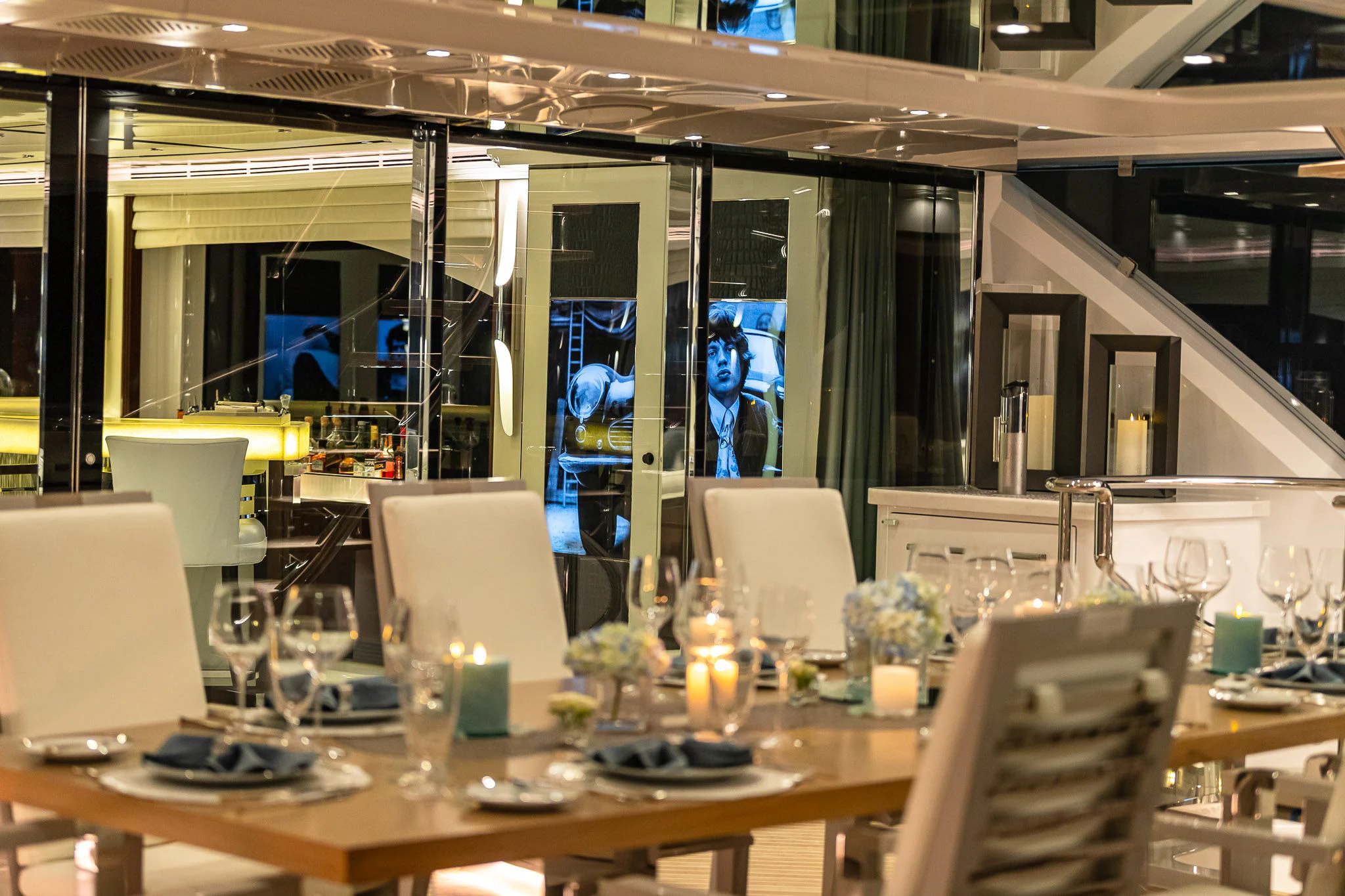 a table with many glasses and plates on it aboard KING BABY Yacht for Sale