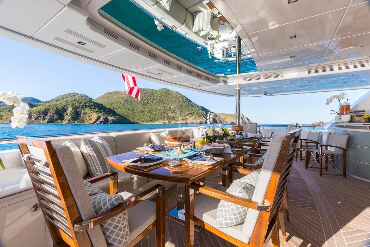 a table set for a meal aboard KING BABY Yacht for Sale