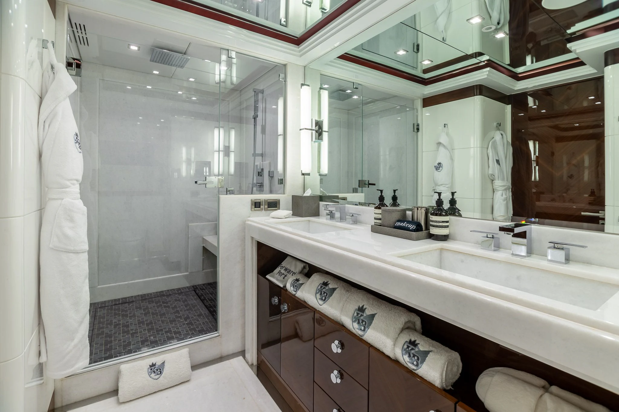 a bathroom with a large mirror aboard KING BABY Yacht for Sale