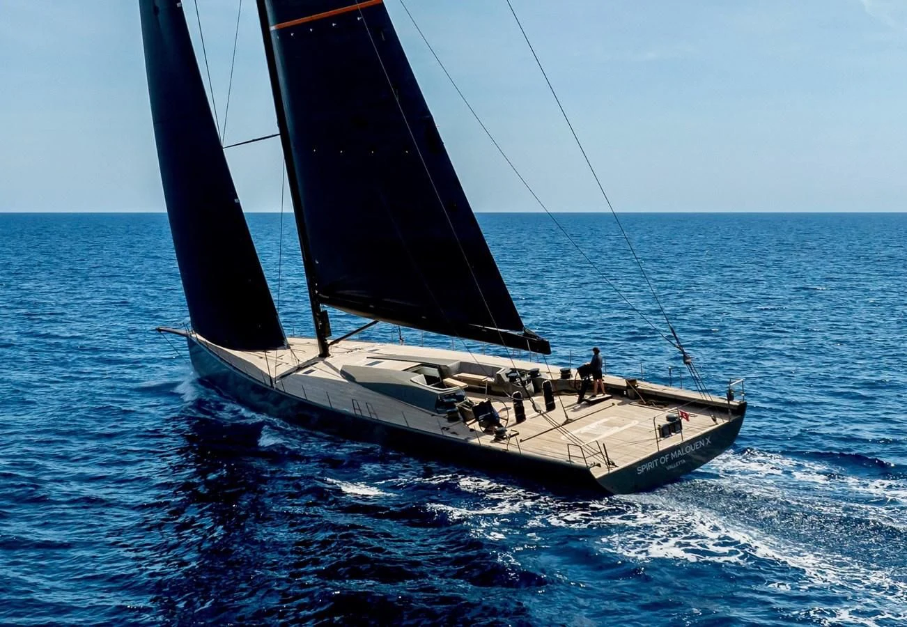 a sailboat on the water aboard SPIRIT OF MALOUEN X Yacht for Sale