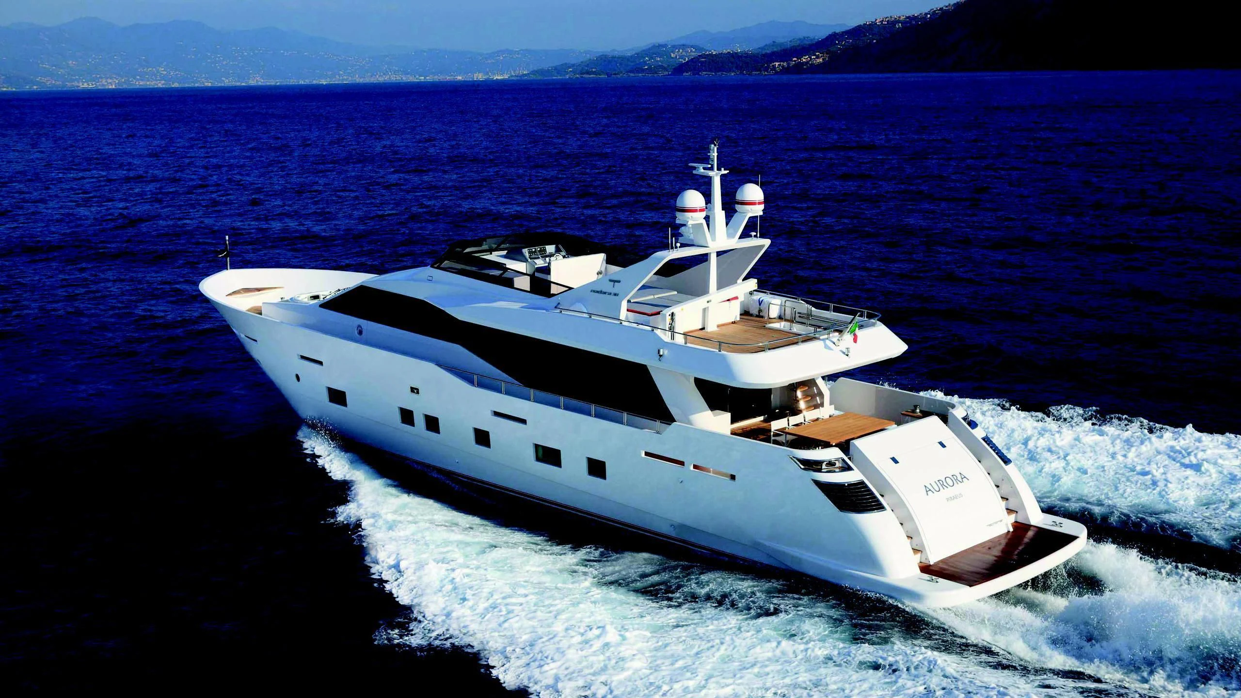 a white yacht on the water aboard AURORA Yacht for Sale