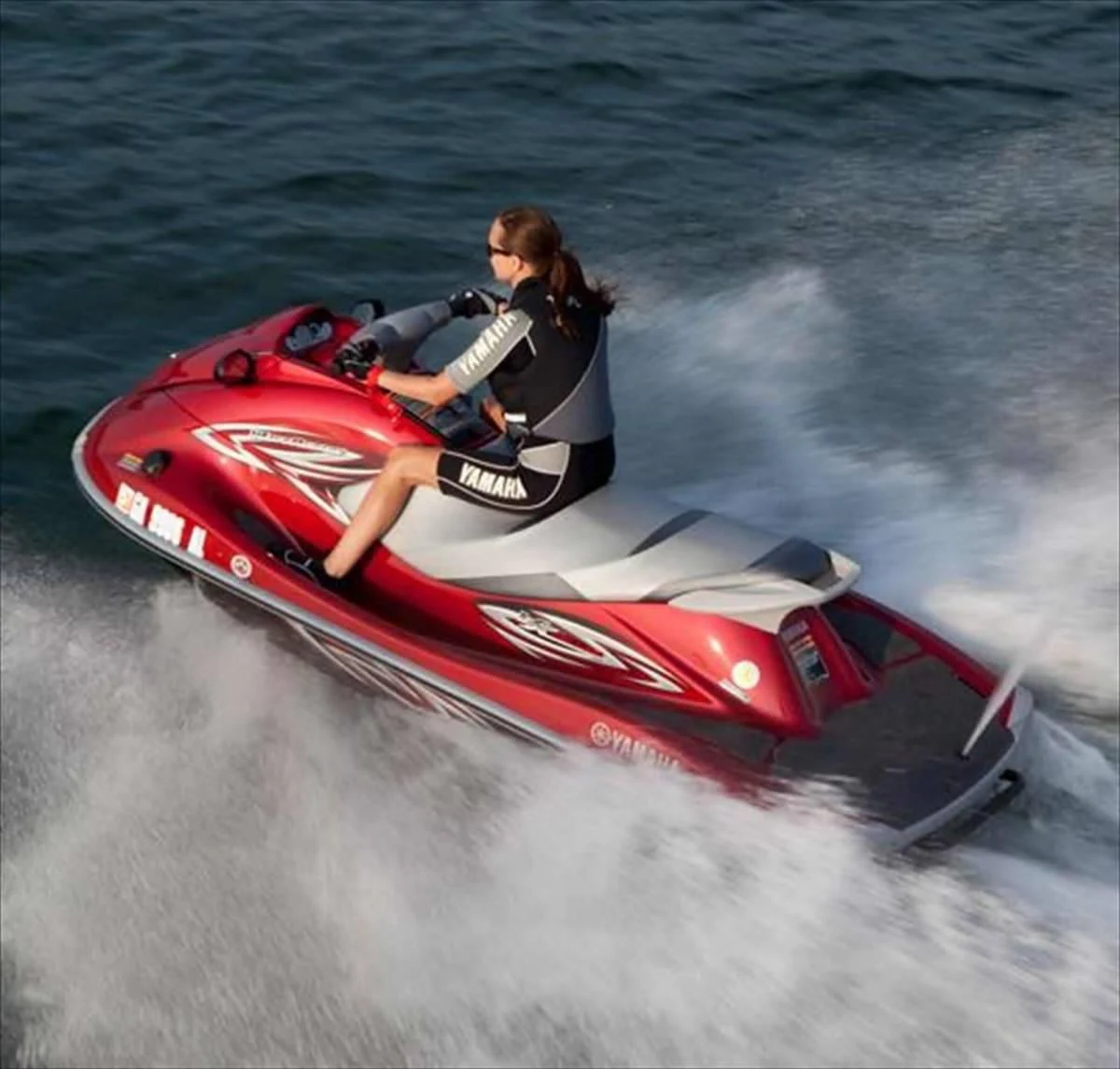 a person on a jet ski aboard AURORA Yacht for Sale