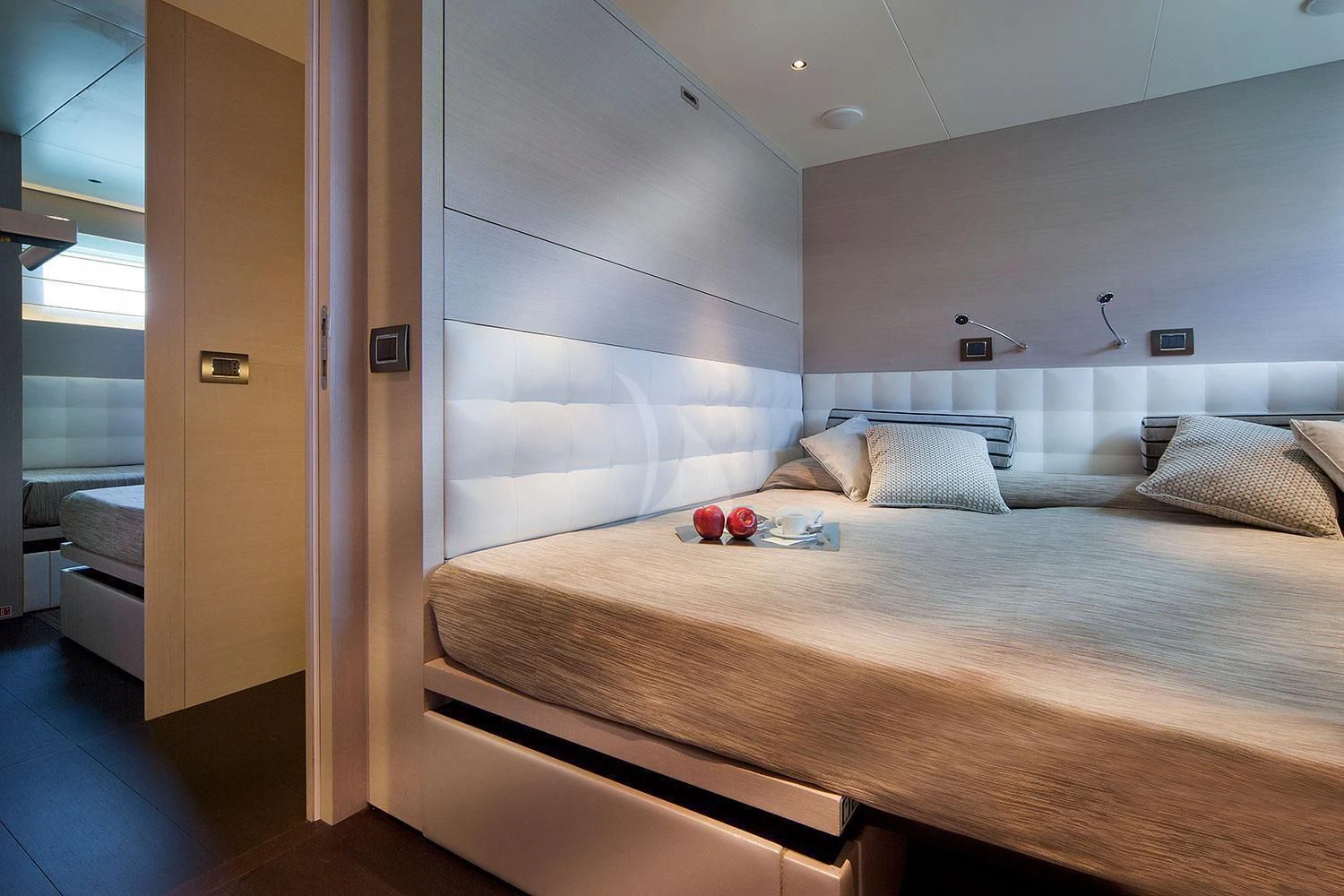 a room with a bed and a window aboard AURORA Yacht for Sale