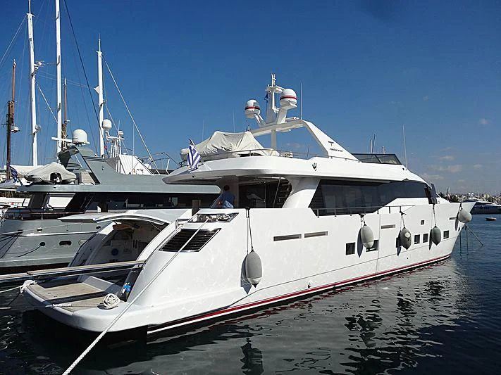 a white boat with a blue sky aboard AURORA Yacht for Sale