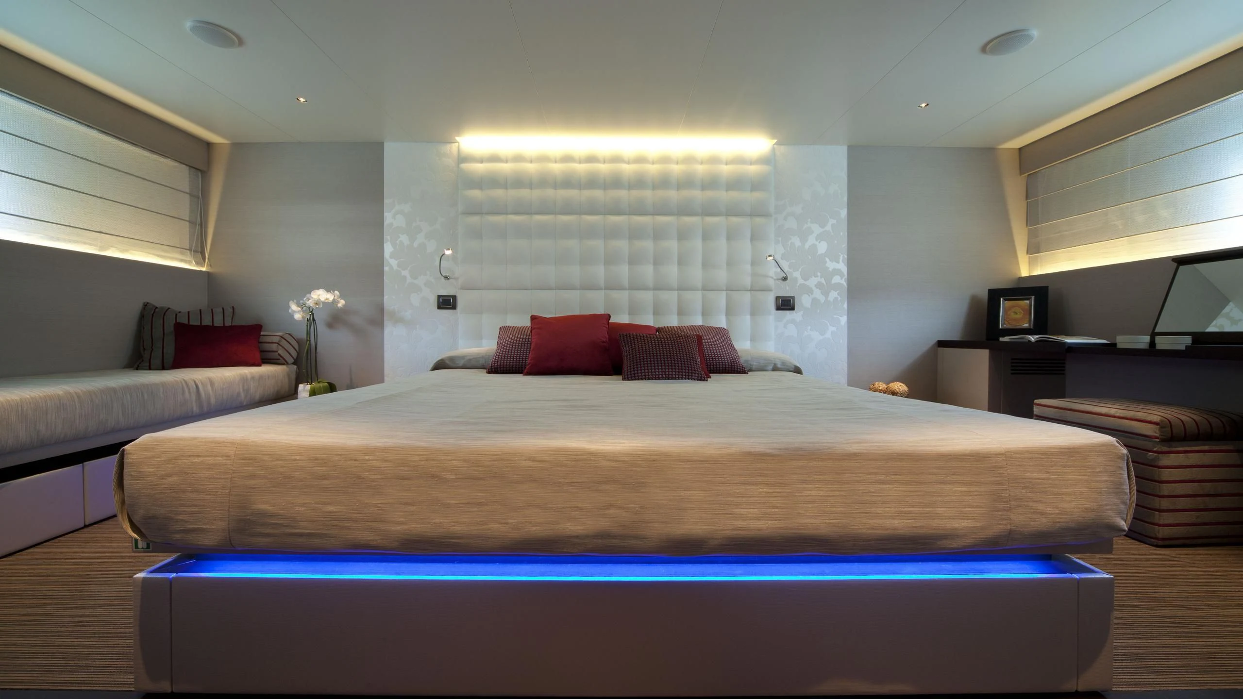 a large bed in a room aboard AURORA Yacht for Sale