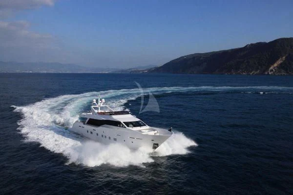 a white boat on the water aboard AURORA Yacht for Sale