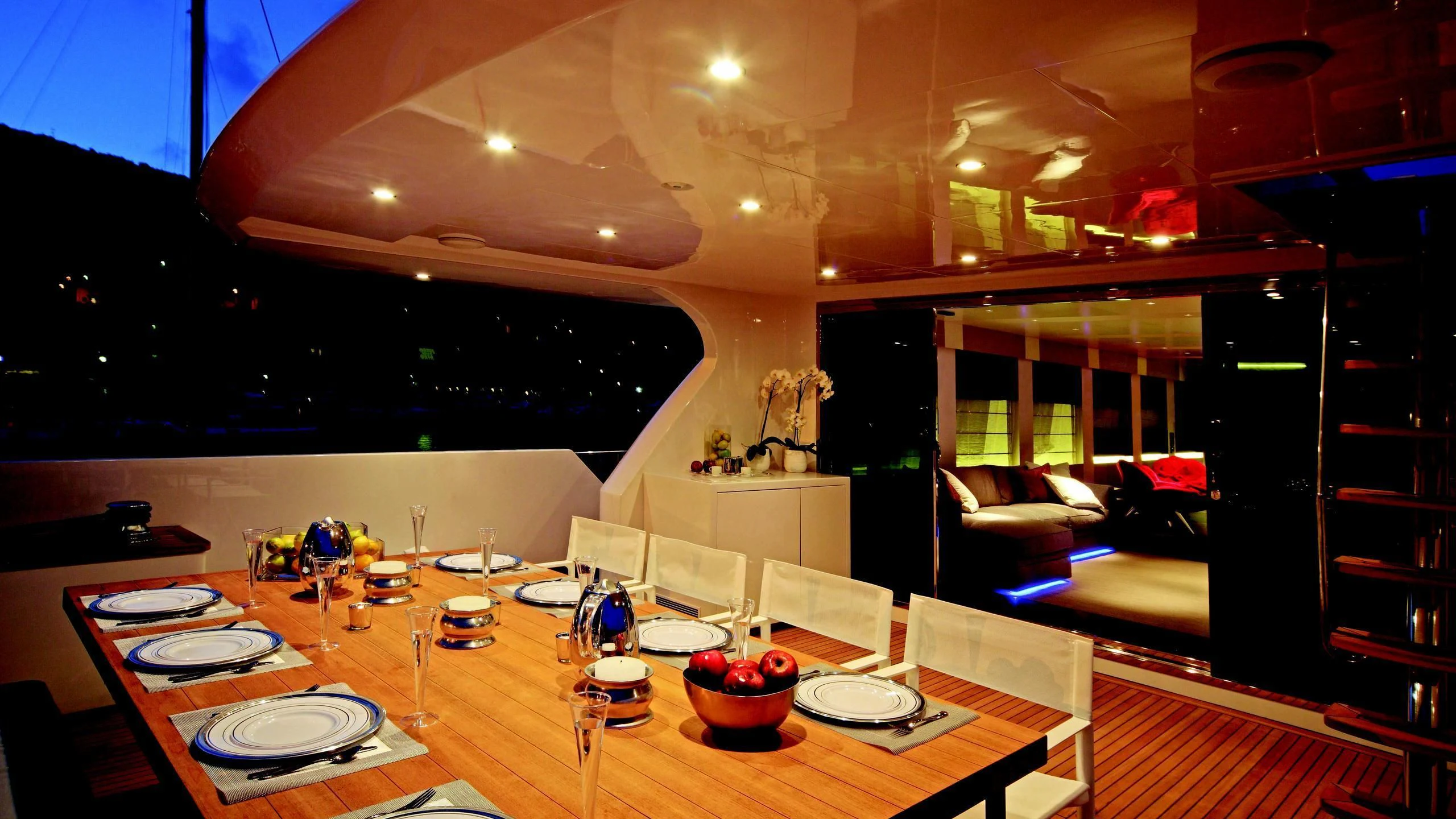 a room with a table and chairs aboard AURORA Yacht for Sale