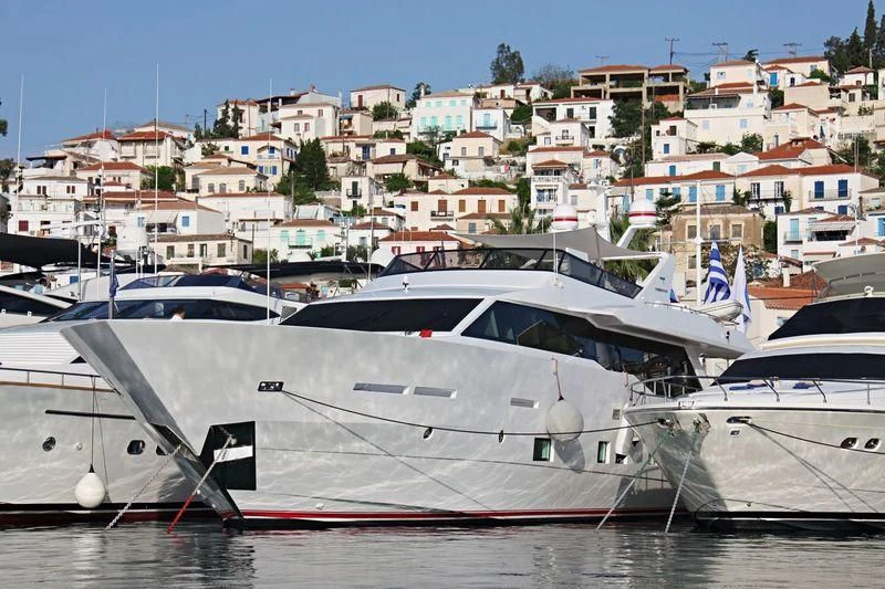 a group of boats sit in a harbor aboard AURORA Yacht for Sale