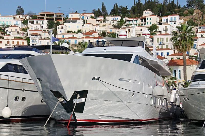 a boat docked at a pier aboard AURORA Yacht for Sale