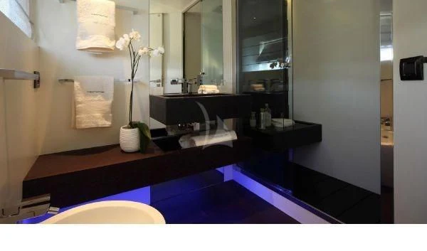 a vase of flowers on a counter aboard AURORA Yacht for Sale