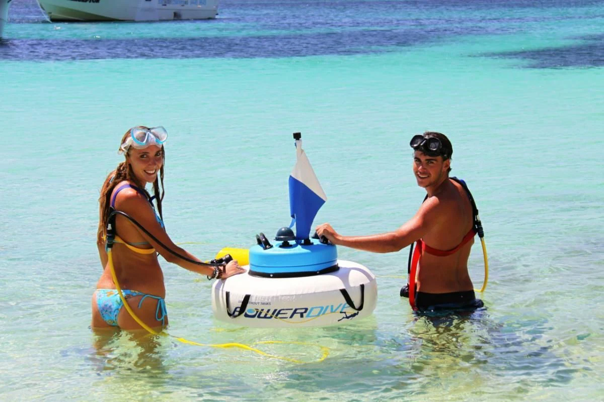 a man and woman on a jet ski in the water aboard AURORA Yacht for Sale