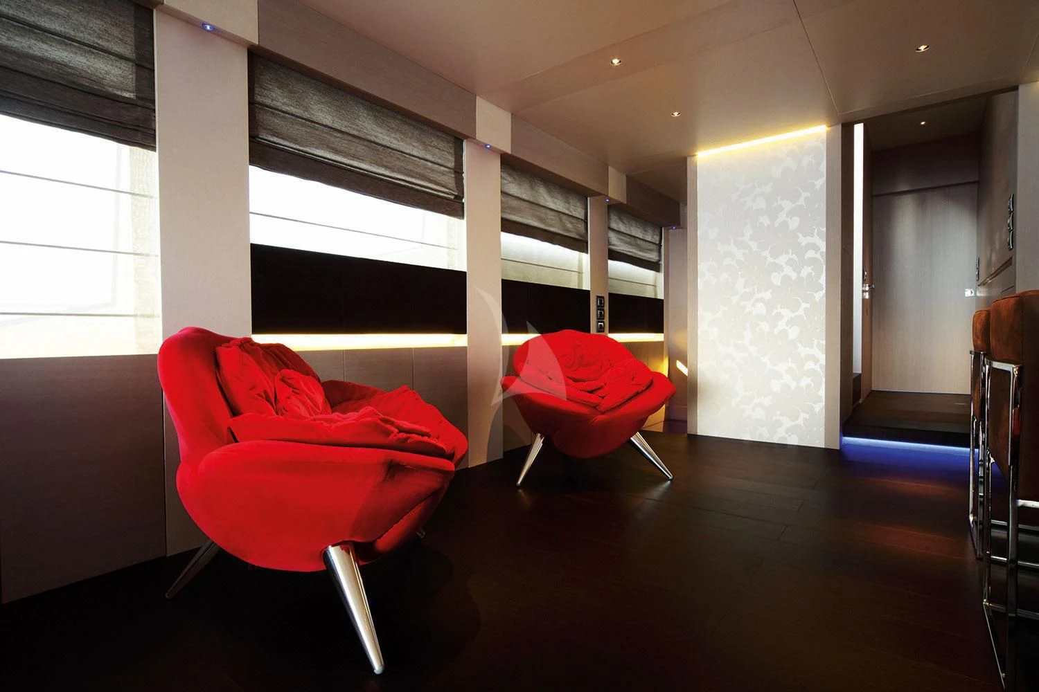 a room with chairs and a table aboard AURORA Yacht for Sale