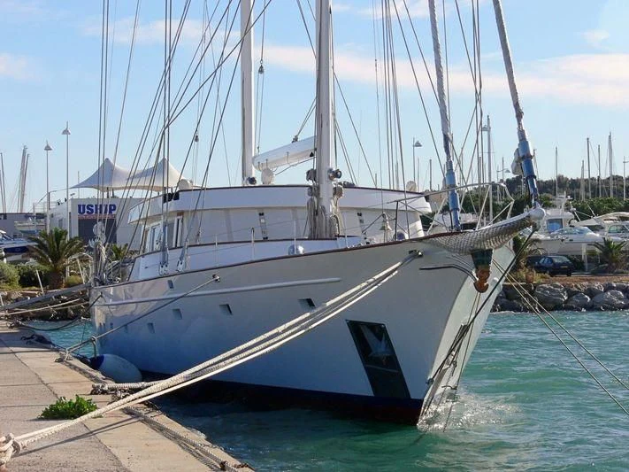 a boat docked at a pier aboard QUEEN NEFERTITI Yacht for Sale