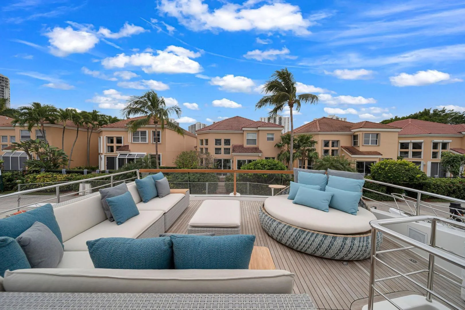 a patio with a couch and a pool aboard PEACEKEEPER Yacht for Sale