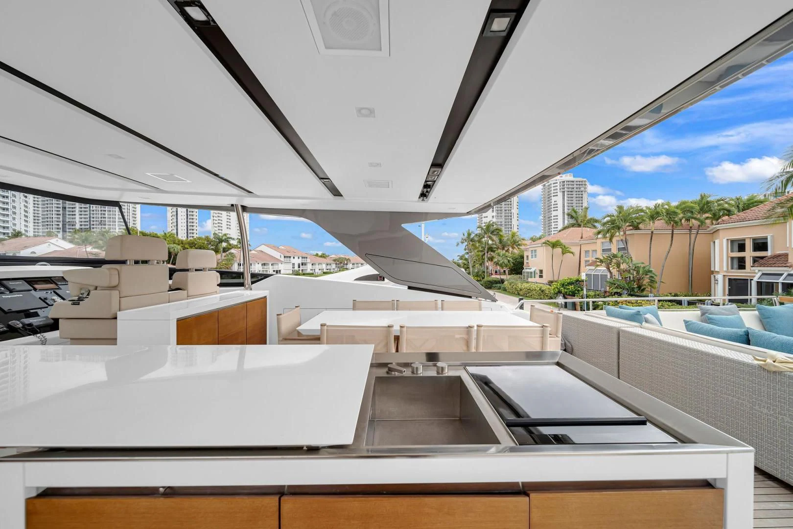a rooftop of a building with a pool and a large glass roof aboard PEACEKEEPER Yacht for Sale