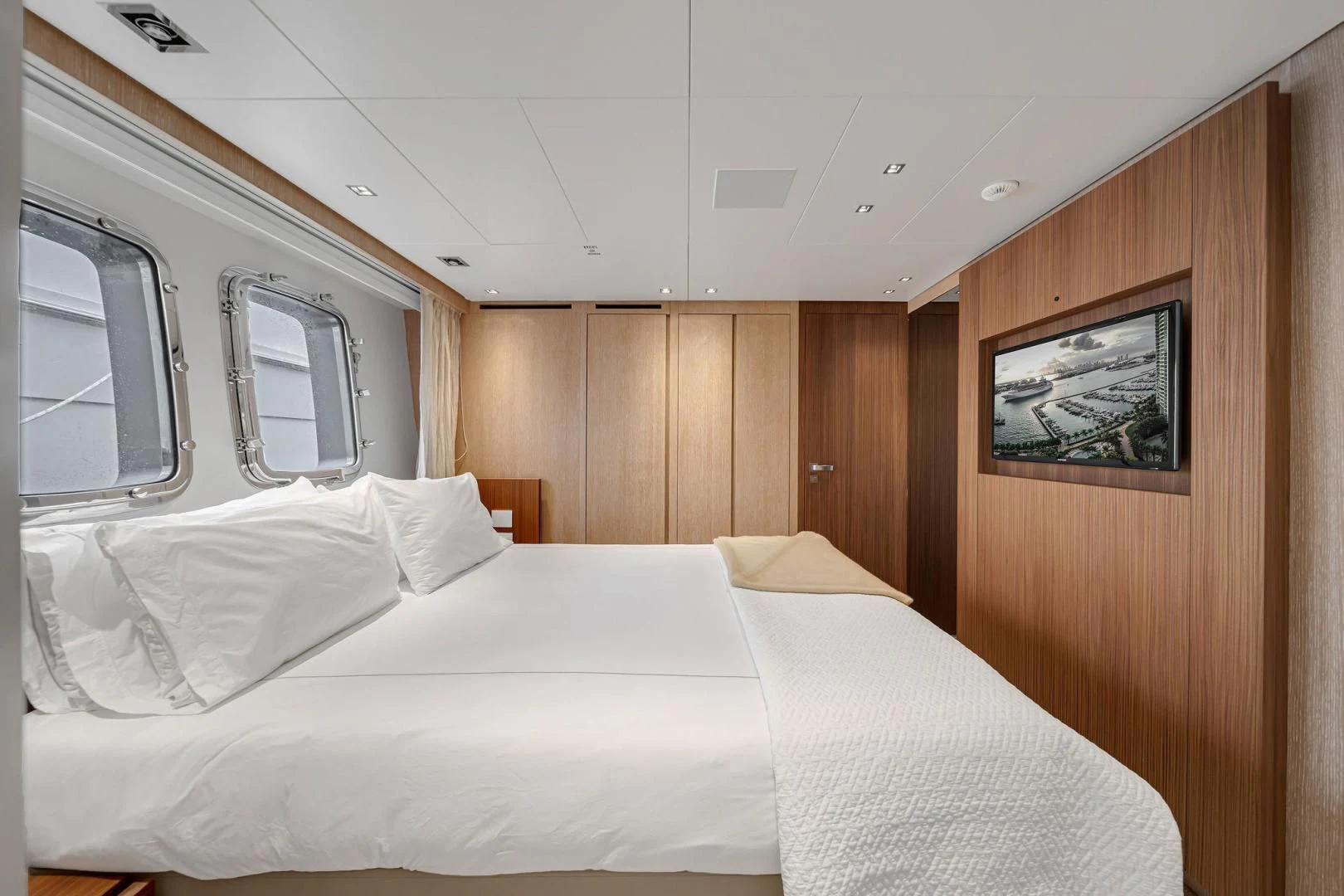 a bed in a room aboard PEACEKEEPER Yacht for Sale