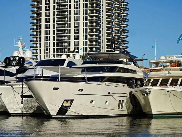 a group of boats in a harbor aboard PEACEKEEPER Yacht for Sale