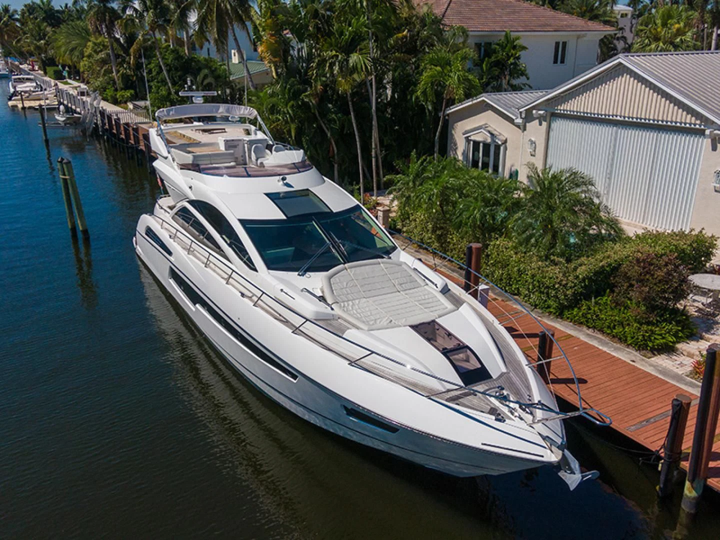 a boat docked at a pier aboard LONG WAY ROUND Yacht for Sale