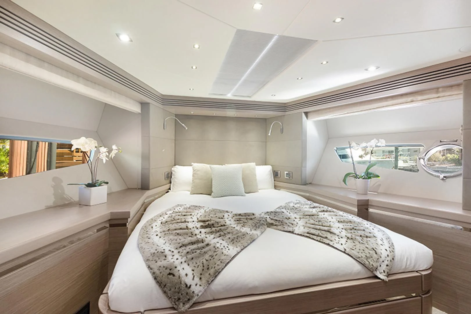 a large bedroom with a large bed aboard LONG WAY ROUND Yacht for Sale