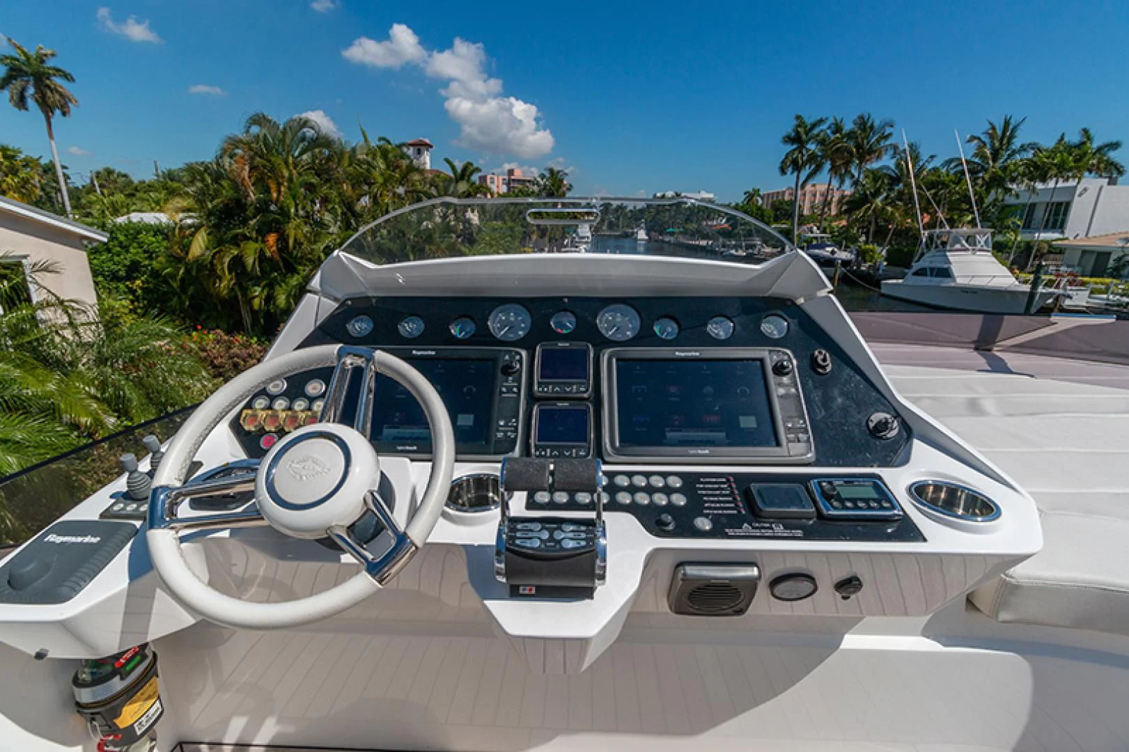 a car with a steering wheel aboard LONG WAY ROUND Yacht for Sale