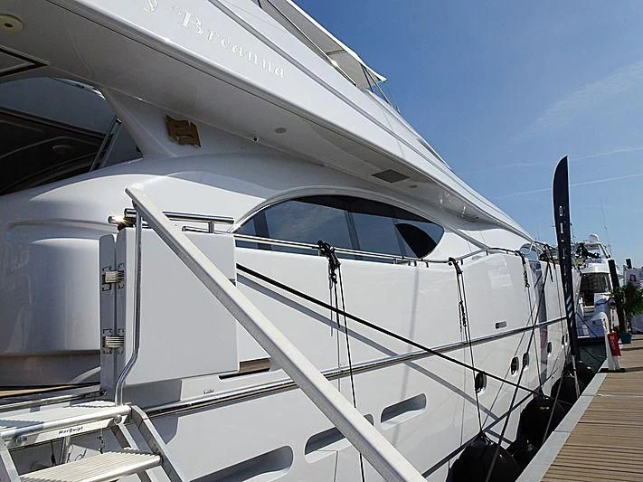 a close-up of a white airplane aboard LADY ARLINGTON Yacht for Sale
