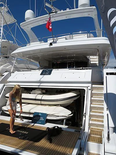 a person standing on a boat aboard LADY ARLINGTON Yacht for Sale