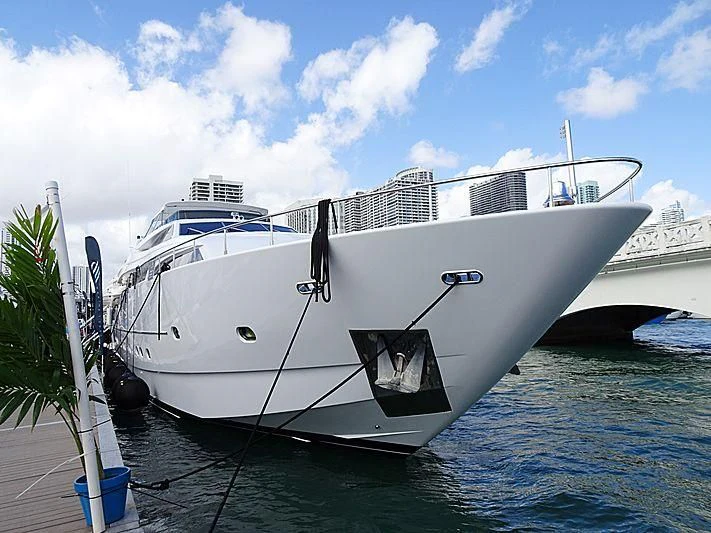 a white boat in the water aboard LADY ARLINGTON Yacht for Sale