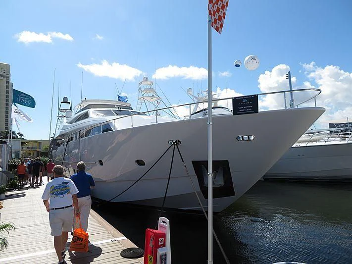 a boat docked at a pier aboard LADY ARLINGTON Yacht for Sale
