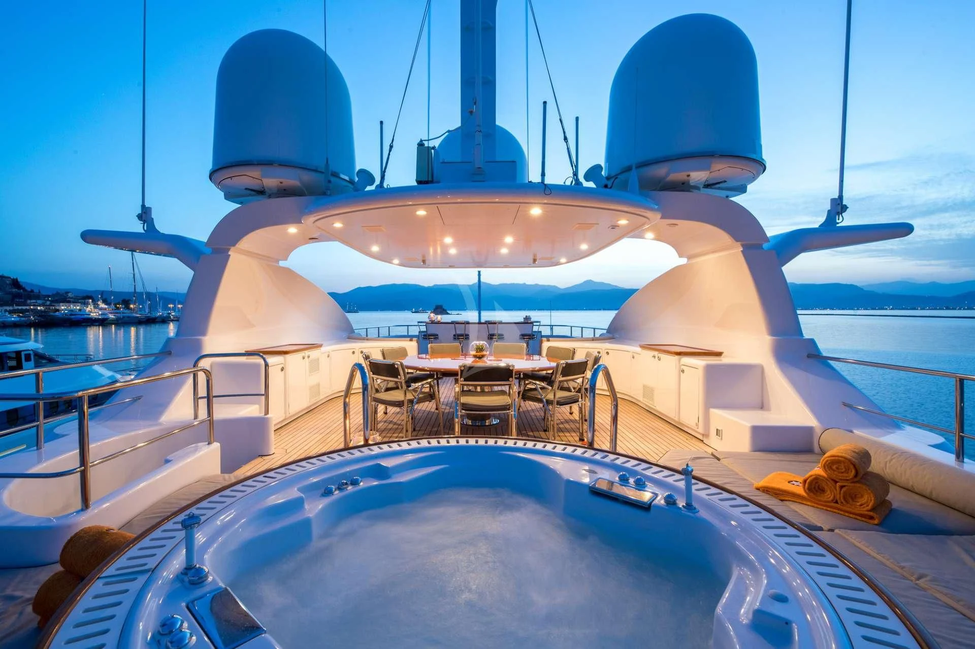 a large yacht with a large white tent on the deck aboard TITIAN PEARL Yacht for Sale