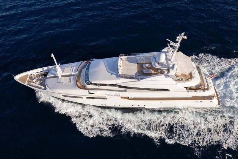 a boat on the water aboard TITIAN PEARL Yacht for Sale